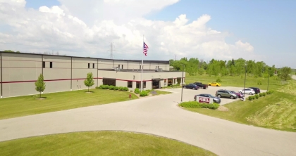 External aerial view of front entrance to wet wipe factory